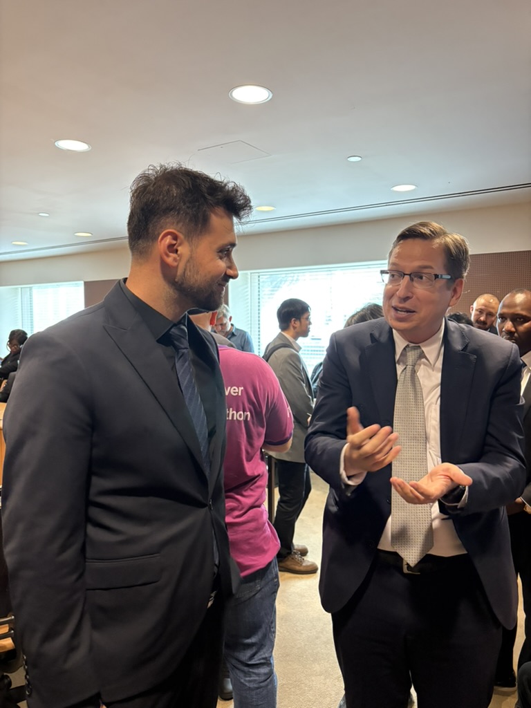 Umut Tutug in conversation at a UN event
