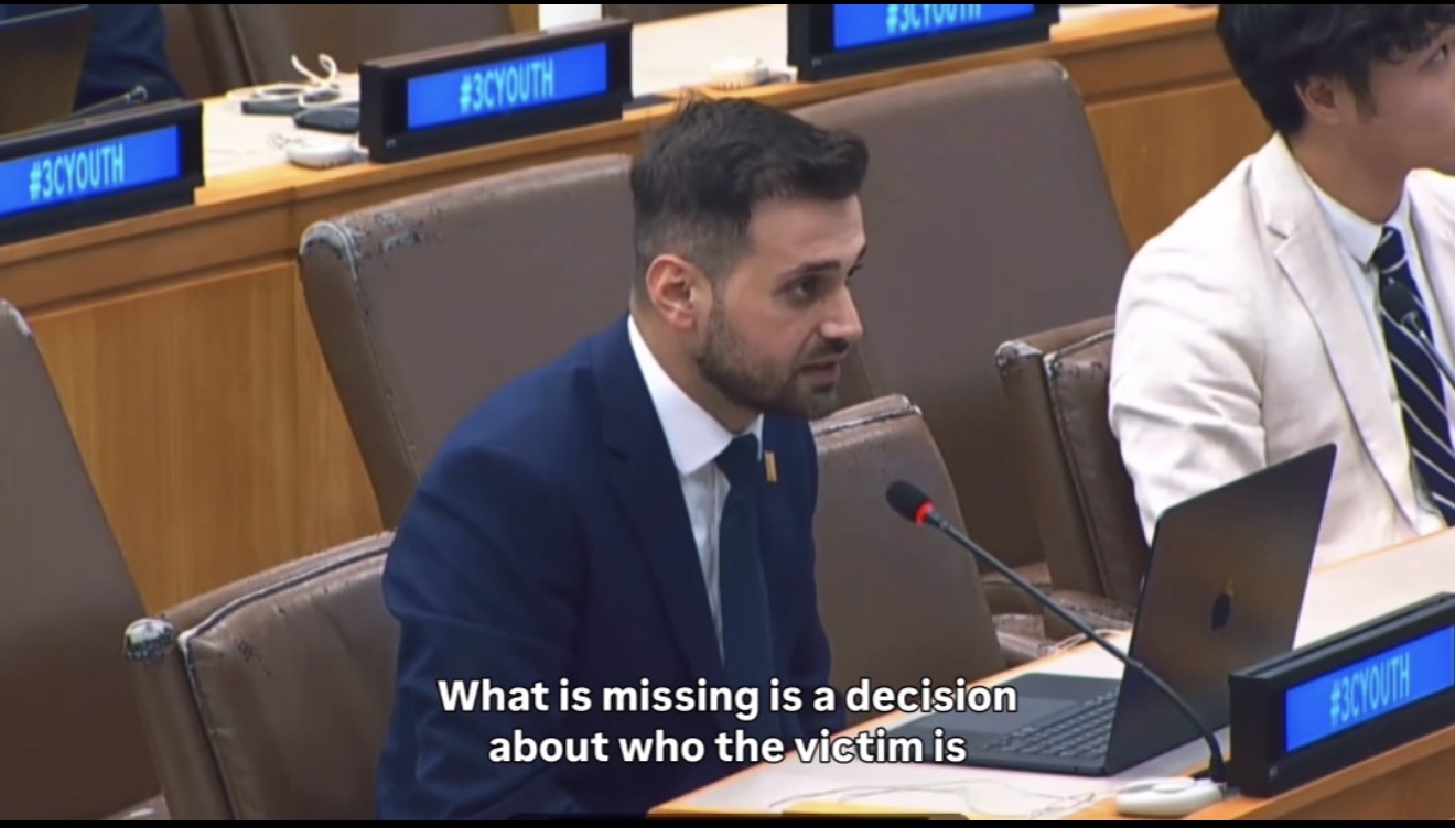 Umut Tutug delivering his intervention on human trafficking at the UN Third Committee Youth Forum